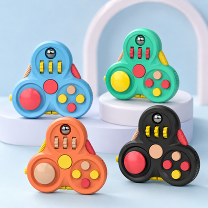 Fidget spinner infantil colorido em composição de estúdio pastel
